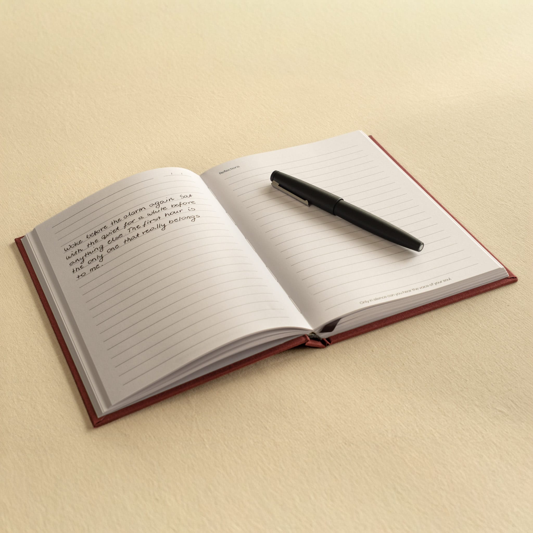 The Bark be still A5 journal open with a Lamy 2000 rollerball resting on the page