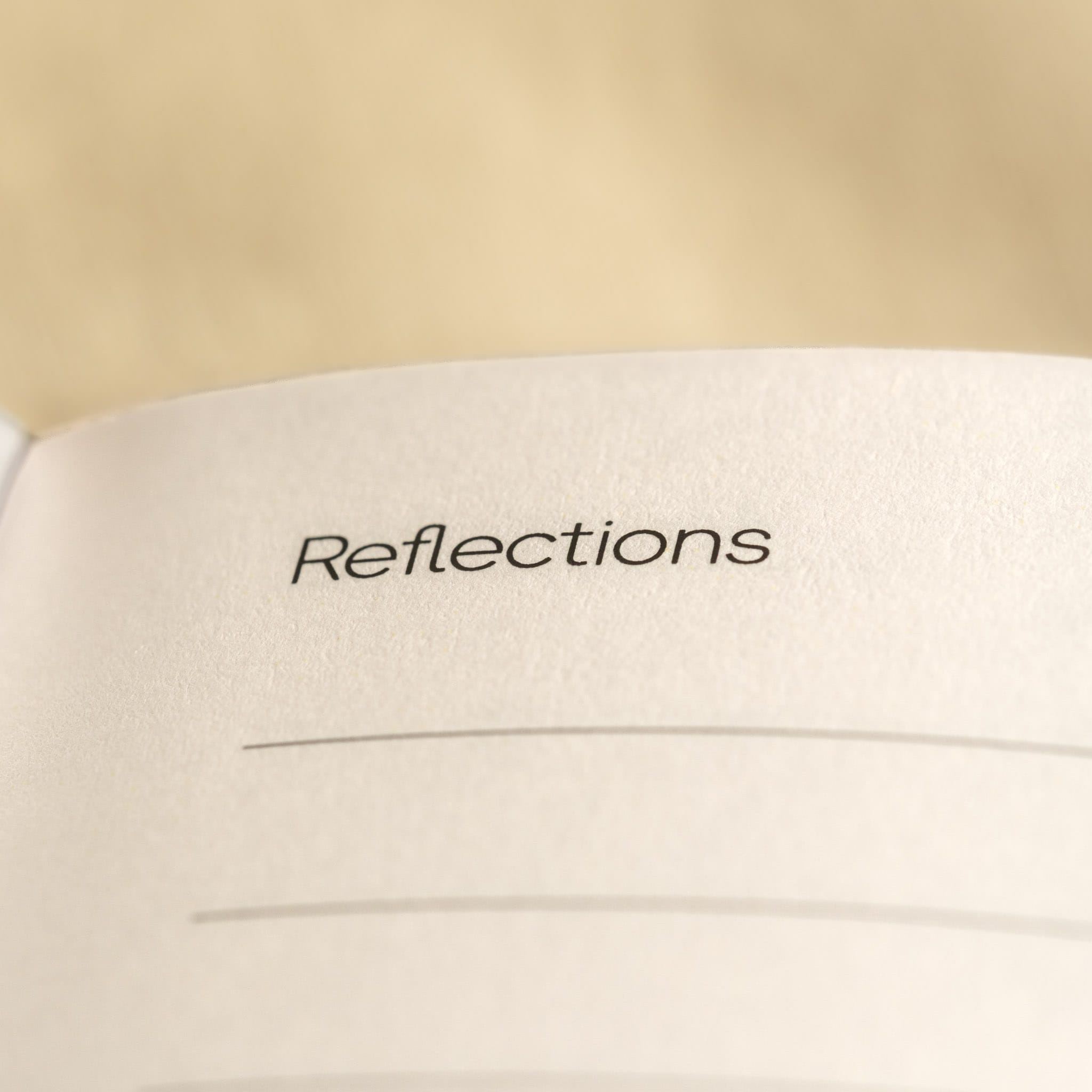 The printed Reflections section header inside the be still journal